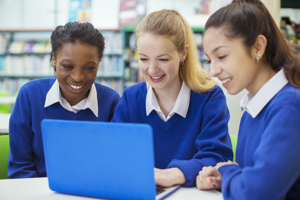 Secondary pupils with laptop