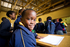 African Boy Reading A Book