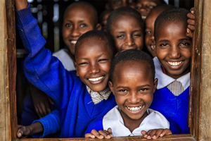 Group Of African School Children Inside Classroom In Very Remote School
