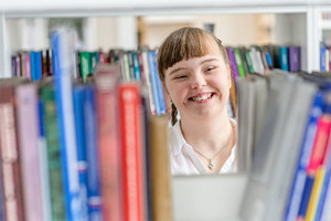 Girl With Syndrome In The Library