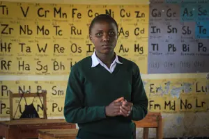 Girl From African School In Classroom ?? title