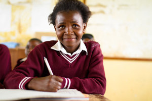 African Girl Works On Her Studies